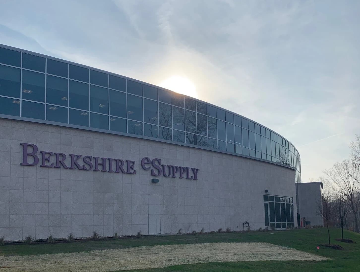 Curved glass curtain wall at Berkshire eSupply glazed by Calvin and Company