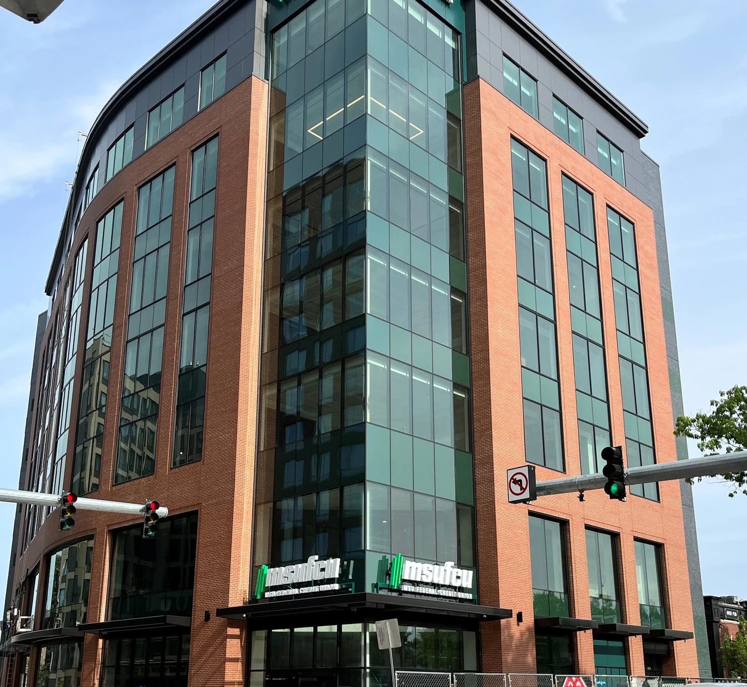 Curved glass curtain wall on the MSU Federal Credit Union building glazed by Calvin and Company